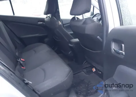 2021 Toyota Prius Le from USA, damaged, VIN JTDKAMFU4M3134389